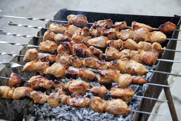 chicken kebab skewers on charcoal grill