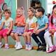 kindergarten class in colorful clothes