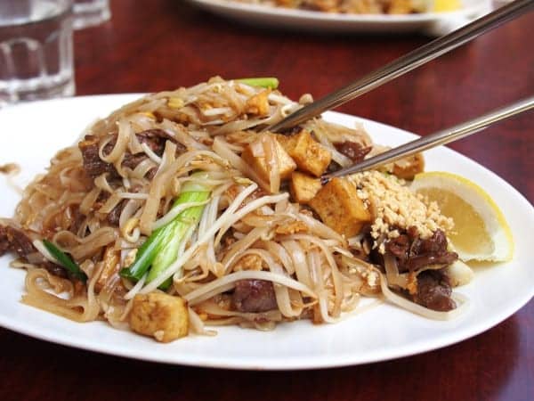 phad thai with tofu, peanuts, leeks, and lemon