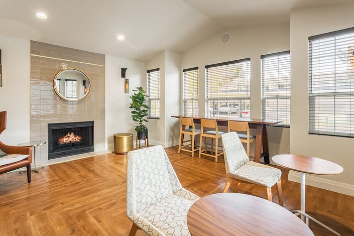 The common area at Haller Post Apartments has a fireplace and places to relax.